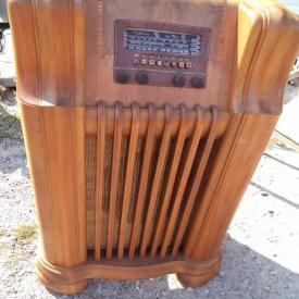 MaxSold Auction: This auction features an antique radio,thickness planer, desks, dressers, credenza, secretary desk, chairs and ottoman, bar server, coffee table, bench, cabinet, bent wood rocker, pine pantry, mantle and finials, vintage vanity, settee, wood planer, air compressor, band saw, drill press, antique cabinet, mirror, and more!